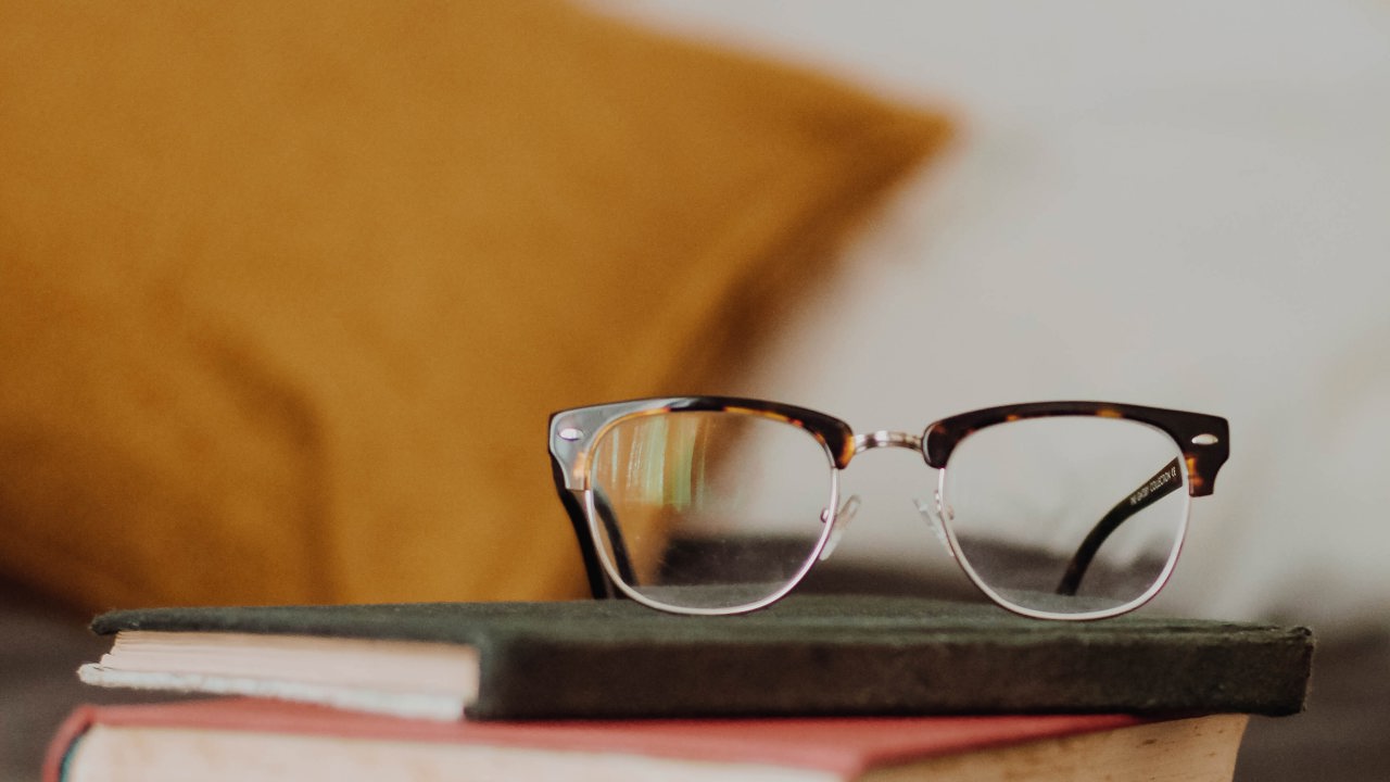 Books and a pair of glasses