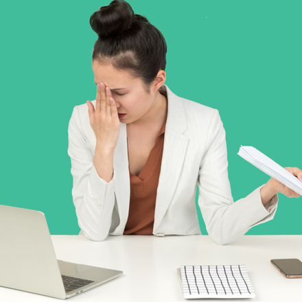 woman frustrated at desk