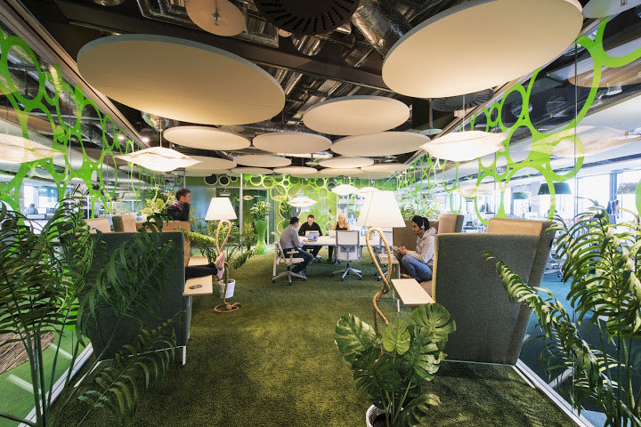 Wide angle view of green open plan office